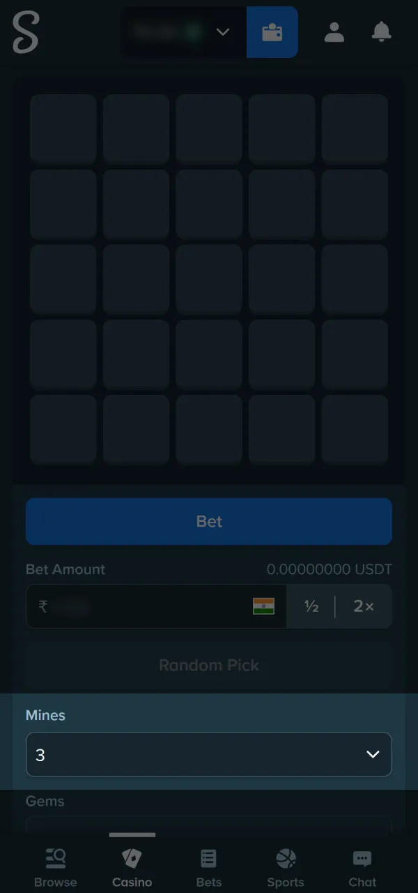 Set your risk preferences on the active Stake mines board.